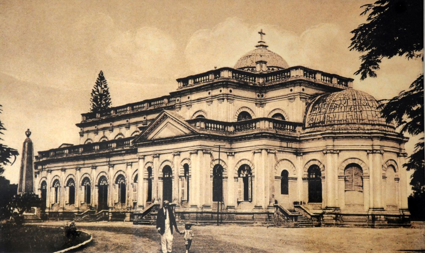 A sepia postcard of St. Mark’s Cathedral with its dome and colonnades